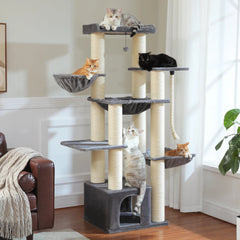 Cat tree with multiple cats on different levels in a living room.