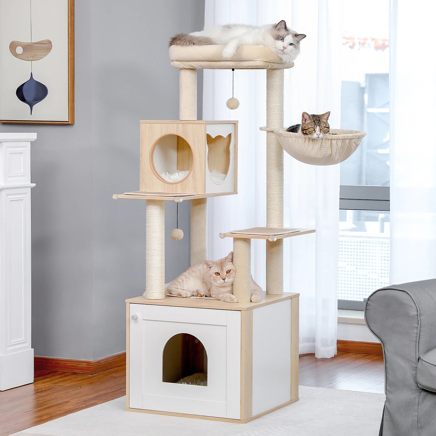 Cat tree with multiple levels and a cat resting on top in a room setting.